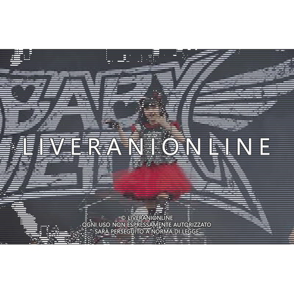 J-Metal group Babymetal perform on the main stage at Sonisphere Festival, Knebworth, UK on 5th July 2014. The band consists of Suzuka Nakamoto (Su-Metal - wearing two gloves), Moa Kikuchi (Moametal - wearing glove on left hand) and Yui Mizuno (Yuimetal - wearing glove on right hand) ©PHOTOSHOT/Agenzia Aldo Liverani sas - ITALY ONLY - EDITORIAL USE ONLY - Il Gruppo Babymetal J-Metal si esibisce sul palco de Festival Sonisphere, Knebworth, Regno Unito il 5 luglio 2014