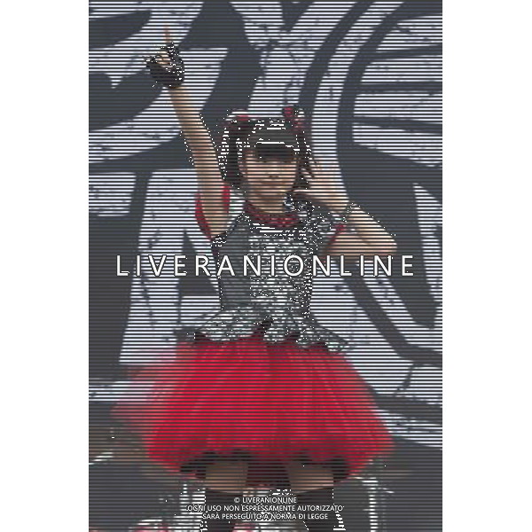 J-Metal group Babymetal perform on the main stage at Sonisphere Festival, Knebworth, UK on 5th July 2014. The band consists of Suzuka Nakamoto (Su-Metal - wearing two gloves), Moa Kikuchi (Moametal - wearing glove on left hand) and Yui Mizuno (Yuimetal - wearing glove on right hand) ©PHOTOSHOT/Agenzia Aldo Liverani sas - ITALY ONLY - EDITORIAL USE ONLY - Il Gruppo Babymetal J-Metal si esibisce sul palco de Festival Sonisphere, Knebworth, Regno Unito il 5 luglio 2014