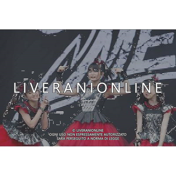 J-Metal group Babymetal perform on the main stage at Sonisphere Festival, Knebworth, UK on 5th July 2014. The band consists of Suzuka Nakamoto (Su-Metal - wearing two gloves), Moa Kikuchi (Moametal - wearing glove on left hand) and Yui Mizuno (Yuimetal - wearing glove on right hand) ©PHOTOSHOT/Agenzia Aldo Liverani sas - ITALY ONLY - EDITORIAL USE ONLY - Il Gruppo Babymetal J-Metal si esibisce sul palco de Festival Sonisphere, Knebworth, Regno Unito il 5 luglio 2014