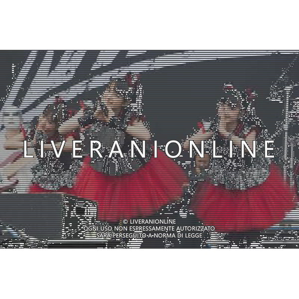 J-Metal group Babymetal perform on the main stage at Sonisphere Festival, Knebworth, UK on 5th July 2014. The band consists of Suzuka Nakamoto (Su-Metal - wearing two gloves), Moa Kikuchi (Moametal - wearing glove on left hand) and Yui Mizuno (Yuimetal - wearing glove on right hand) ©PHOTOSHOT/Agenzia Aldo Liverani sas - ITALY ONLY - EDITORIAL USE ONLY - Il Gruppo Babymetal J-Metal si esibisce sul palco de Festival Sonisphere, Knebworth, Regno Unito il 5 luglio 2014
