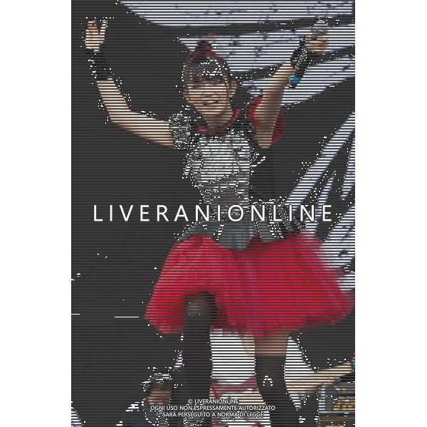 J-Metal group Babymetal perform on the main stage at Sonisphere Festival, Knebworth, UK on 5th July 2014. The band consists of Suzuka Nakamoto (Su-Metal - wearing two gloves), Moa Kikuchi (Moametal - wearing glove on left hand) and Yui Mizuno (Yuimetal - wearing glove on right hand) ©PHOTOSHOT/Agenzia Aldo Liverani sas - ITALY ONLY - EDITORIAL USE ONLY - Il Gruppo Babymetal J-Metal si esibisce sul palco de Festival Sonisphere, Knebworth, Regno Unito il 5 luglio 2014