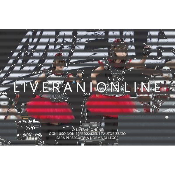 J-Metal group Babymetal perform on the main stage at Sonisphere Festival, Knebworth, UK on 5th July 2014. The band consists of Suzuka Nakamoto (Su-Metal - wearing two gloves), Moa Kikuchi (Moametal - wearing glove on left hand) and Yui Mizuno (Yuimetal - wearing glove on right hand) ©PHOTOSHOT/Agenzia Aldo Liverani sas - ITALY ONLY - EDITORIAL USE ONLY - Il Gruppo Babymetal J-Metal si esibisce sul palco de Festival Sonisphere, Knebworth, Regno Unito il 5 luglio 2014