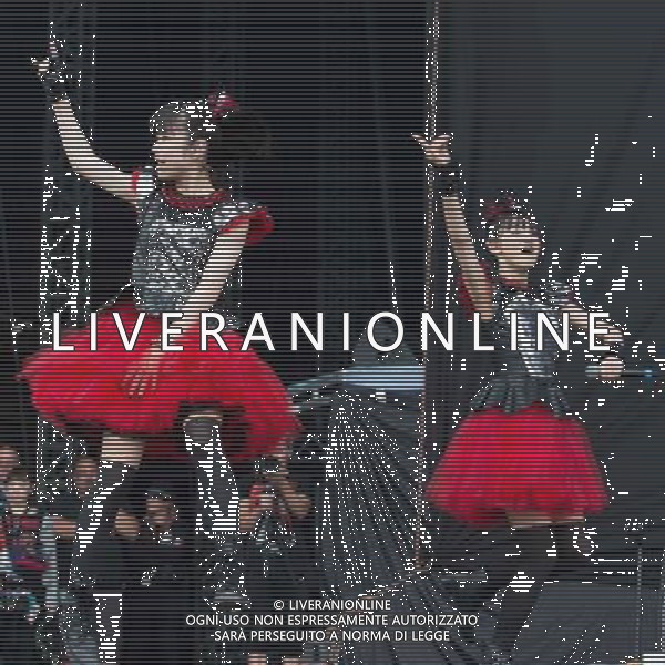 J-Metal group Babymetal perform on the main stage at Sonisphere Festival, Knebworth, UK on 5th July 2014. The band consists of Suzuka Nakamoto (Su-Metal - wearing two gloves), Moa Kikuchi (Moametal - wearing glove on left hand) and Yui Mizuno (Yuimetal - wearing glove on right hand) ©PHOTOSHOT/Agenzia Aldo Liverani sas - ITALY ONLY - EDITORIAL USE ONLY - Il Gruppo Babymetal J-Metal si esibisce sul palco de Festival Sonisphere, Knebworth, Regno Unito il 5 luglio 2014