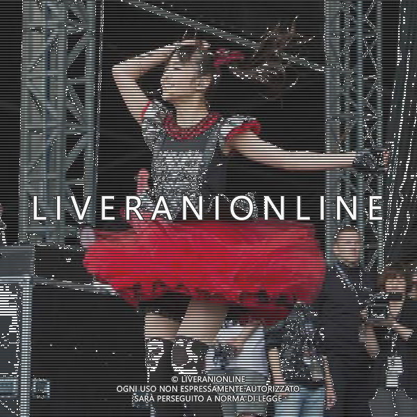 J-Metal group Babymetal perform on the main stage at Sonisphere Festival, Knebworth, UK on 5th July 2014. The band consists of Suzuka Nakamoto (Su-Metal - wearing two gloves), Moa Kikuchi (Moametal - wearing glove on left hand) and Yui Mizuno (Yuimetal - wearing glove on right hand) ©PHOTOSHOT/Agenzia Aldo Liverani sas - ITALY ONLY - EDITORIAL USE ONLY - Il Gruppo Babymetal J-Metal si esibisce sul palco de Festival Sonisphere, Knebworth, Regno Unito il 5 luglio 2014