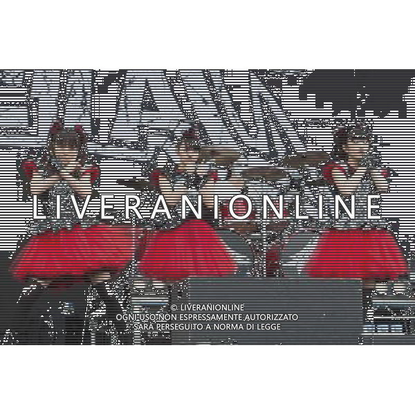 J-Metal group Babymetal perform on the main stage at Sonisphere Festival, Knebworth, UK on 5th July 2014. The band consists of Suzuka Nakamoto (Su-Metal - wearing two gloves), Moa Kikuchi (Moametal - wearing glove on left hand) and Yui Mizuno (Yuimetal - wearing glove on right hand) ©PHOTOSHOT/Agenzia Aldo Liverani sas - ITALY ONLY - EDITORIAL USE ONLY - Il Gruppo Babymetal J-Metal si esibisce sul palco de Festival Sonisphere, Knebworth, Regno Unito il 5 luglio 2014