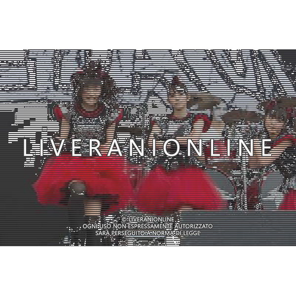 J-Metal group Babymetal perform on the main stage at Sonisphere Festival, Knebworth, UK on 5th July 2014. The band consists of Suzuka Nakamoto (Su-Metal - wearing two gloves), Moa Kikuchi (Moametal - wearing glove on left hand) and Yui Mizuno (Yuimetal - wearing glove on right hand) ©PHOTOSHOT/Agenzia Aldo Liverani sas - ITALY ONLY - EDITORIAL USE ONLY - Il Gruppo Babymetal J-Metal si esibisce sul palco de Festival Sonisphere, Knebworth, Regno Unito il 5 luglio 2014