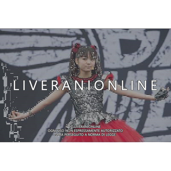 J-Metal group Babymetal perform on the main stage at Sonisphere Festival, Knebworth, UK on 5th July 2014. The band consists of Suzuka Nakamoto (Su-Metal - wearing two gloves), Moa Kikuchi (Moametal - wearing glove on left hand) and Yui Mizuno (Yuimetal - wearing glove on right hand) ©PHOTOSHOT/Agenzia Aldo Liverani sas - ITALY ONLY - EDITORIAL USE ONLY - Il Gruppo Babymetal J-Metal si esibisce sul palco de Festival Sonisphere, Knebworth, Regno Unito il 5 luglio 2014