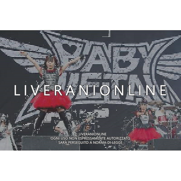 J-Metal group Babymetal perform on the main stage at Sonisphere Festival, Knebworth, UK on 5th July 2014. The band consists of Suzuka Nakamoto (Su-Metal - wearing two gloves), Moa Kikuchi (Moametal - wearing glove on left hand) and Yui Mizuno (Yuimetal - wearing glove on right hand) ©PHOTOSHOT/Agenzia Aldo Liverani sas - ITALY ONLY - EDITORIAL USE ONLY - Il Gruppo Babymetal J-Metal si esibisce sul palco de Festival Sonisphere, Knebworth, Regno Unito il 5 luglio 2014