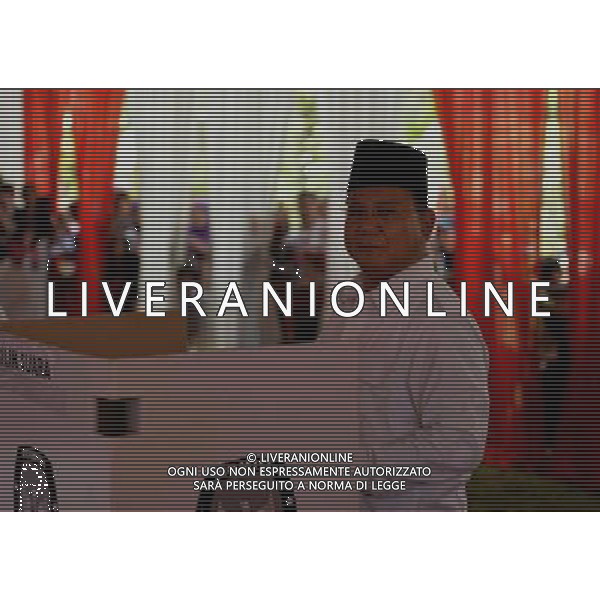 (140709) -- BONGOR, July 9, 2014 () -- Presidential candidate Prabowo Subianto speaks to the media after casting his vote at a polling station in Bogor of West Java Province, Indonesia, July 8, 2014. Indonesians went to polls on July 9 to elect their new president from Jakarta Governor Joko Widodo, 53, and former general Prabowo Subianto, 63. (/He Changshan) ©PHOTOSHOT/Agenzia Aldo Liverani sas - ITALY ONLY - EDITORIAL USE ONLY - Operazioni di voto in un seggio elettorale a Bogor della provincia di West Java, Indonesia, 8 Luglio 2014 per le elezioni presidenziali