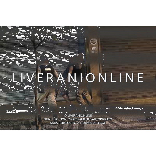 (140708) -- BELO HORIZONTE, July 8, 2014 (Xinhua) -- Police officers arrest an overreacting football fan after a semifinal match between Brazil and Germany of 2014 FIFA World Cup at the Savassi Plaza in Belo Horizonte, Brazil, on July 8, 2014. (Xinhua/Mauricio Valenzuela) ©PHOTOSHOT/Agenzia Aldo Liverani sas - ITALY ONLY - EDITORIAL USE ONLY - BRASILE VS GERMANIA partita di semifinale Coppa del mondo FIFA 2014 Mineirao stadio Estadio a Belo Horizonte, in Brasile, 8 luglio 2014, la Germania ha vinto 7-1 e qualificato per la finale