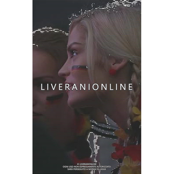 (140709) -- FRANKFURT, July 9, () -- A German football fan reacts as she watch the 2014 World Cup semifinal match between Germany and Brazil, at a public viewing event in Frankfurt, Germany, July 8, 2014. (/Luo Huanhuan) ©PHOTOSHOT/Agenzia Aldo Liverani sas - ITALY ONLY - EDITORIAL USE ONLY - BRASILE VS GERMANIA partita di semifinale Coppa del mondo FIFA 2014 Mineirao stadio Estadio a Belo Horizonte, in Brasile, 8 luglio 2014, la Germania ha vinto 7-1 e qualificato per la finale