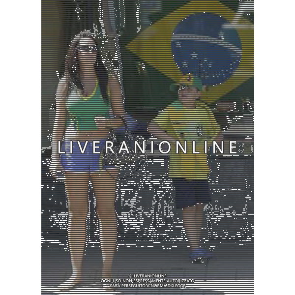 (140709) -- VANCOUVER, July 9, 2014 () -- Brazilian soccer fans are disappointed after they watch a live broadcast of the FIFA World Cup semifinal between Brazil and Germany, at a restaurant in Vancouver, Canada, on July 8, 2014. (/Liang Sen) ©photoshot/Agenzia Aldo Liverani sas - ITALY ONLY - EDITORIAL USE ONLY - BRASILE VS GERMANIA partita di semifinale Coppa del mondo FIFA 2014 Mineirao stadio Estadio a Belo Horizonte, in Brasile, 8 luglio 2014, la Germania ha vinto 7-1 e qualificato per la finale
