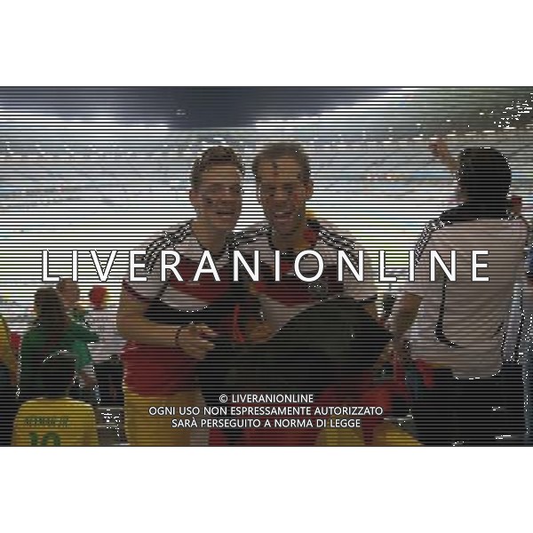 (140708) -- BELO HORIZONTE, July 8, 2014 () -- Germany\'s fans celebrate the victory after a semifinal match between Brazil and Germany of 2014 FIFA World Cup at the Estadio Mineirao Stadium in Belo Horizonte, Brazil, on July 8, 2014. Germany won 7-1 over Brazil and qualified for the final on Tuesday. (/Li Ming)(pcy) ©photoshot/Agenzia Aldo Liverani sas - ITALY ONLY - EDITORIAL USE ONLY - BRASILE VS GERMANIA partita di semifinale Coppa del mondo FIFA 2014 Mineirao stadio Estadio a Belo Horizonte, in Brasile, 8 luglio 2014, la Germania ha vinto 7-1 e qualificato per la finale