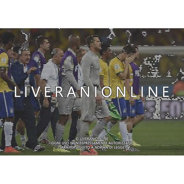 (140708) -- BELO HORIZONTE, July 8, 2014 () -- Brazil\'s players leave the field after a semifinal match between Brazil and Germany of 2014 FIFA World Cup at the Estadio Mineirao Stadium in Belo Horizonte, Brazil, on July 8, 2014. Germany won 7-1 over Brazil and qualified for the final on Tuesday. (/Qi Heng)(pcy) ©photoshot/Agenzia Aldo Liverani sas - ITALY ONLY - EDITORIAL USE ONLY - BRASILE VS GERMANIA partita di semifinale Coppa del mondo FIFA 2014 Mineirao stadio Estadio a Belo Horizonte, in Brasile, 8 luglio 2014, la Germania ha vinto 7-1 e qualificato per la finale
