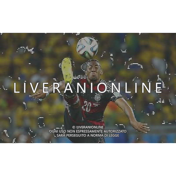 (140708) -- BELO HORIZONTE, July 8, 2014 () -- Germany\'s Jerome Boateng vies for the ball during a semifinal match between Brazil and Germany of 2014 FIFA World Cup at the Estadio Mineirao Stadium in Belo Horizonte, Brazil, on July 8, 2014. Germany won 7-1 over Brazil and qualified for the final on Tuesday.(/Chen Jianli)(rh) ©photoshot/Agenzia Aldo Liverani sas - ITALY ONLY - EDITORIAL USE ONLY - BRASILE VS GERMANIA partita di semifinale Coppa del mondo FIFA 2014 Mineirao stadio Estadio a Belo Horizonte, in Brasile, 8 luglio 2014, la Germania ha vinto 7-1 e qualificato per la finale