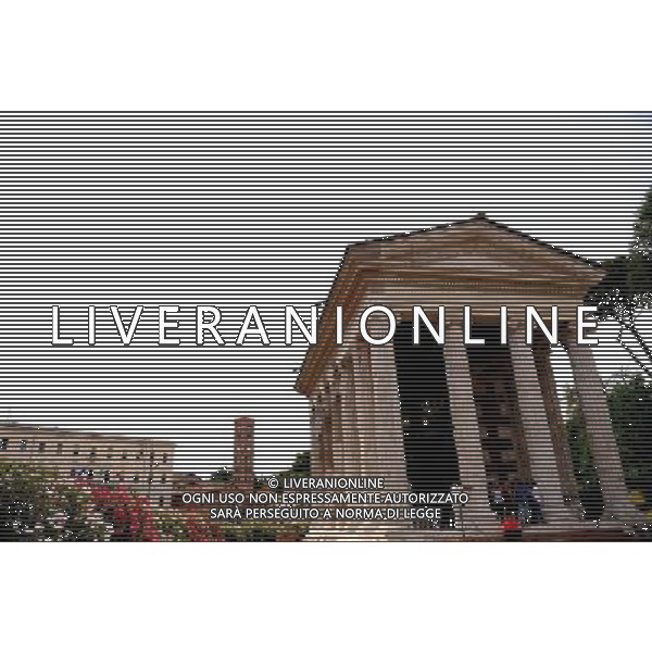 (140710) -- ROME, July 10, 2014 () -- Photo taken on July 10, 2014 shows the reopened Temple of Portunus in Rome, capital of Italy. The Temple of Portunus reopened here Wednesday after a long time restoration supported by World Monuments Fund. Temple of Portunus was built in 75 BC, and it was the main temple dedicated to the God Portunus in Rome. (/Xu Nizhi) (zjl) ©PHOTOSHOT/Agenzia Aldo Liverani sas - - ITALY ONLY - EDITORIAL USE ONLY - Riapertura del Tempio di Portuno a Roma, in Italia, 10 luglio 2014 dopo un lungo restauro sostenuto dalla World Monuments Fund, fu costruito nel 75 aC, ed era il tempio principale dedicato al dio Portunus a Roma