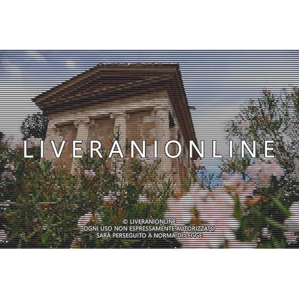 (140710) -- ROME, July 10, 2014 () -- Photo taken on July 10, 2014 shows the reopened Temple of Portunus in Rome, capital of Italy. The Temple of Portunus reopened here Wednesday after a long time restoration supported by World Monuments Fund. Temple of Portunus was built in 75 BC, and it was the main temple dedicated to the God Portunus in Rome. (/Xu Nizhi) (zjl) ©PHOTOSHOT/Agenzia Aldo Liverani sas - - ITALY ONLY - EDITORIAL USE ONLY - Riapertura del Tempio di Portuno a Roma, in Italia, 10 luglio 2014 dopo un lungo restauro sostenuto dalla World Monuments Fund, fu costruito nel 75 aC, ed era il tempio principale dedicato al dio Portunus a Roma