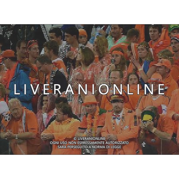 (140709) -- SAO PAULO, July 9, 2014 () -- Netherlands\' fans react after a semifinal match between Netherlands and Argentina of 2014 FIFA World Cup at the Arena de Sao Paulo Stadium in Sao Paulo, Brazil, on July 9, 2014. Argentina won 4-2 on penalties over Netherlands after a 0-0 tie and qualified for the final on Wednesday.(/Wang Yuguo)(rh) ©PHOTOSHOT/Agenzia Aldo Liverani sas - - ITALY ONLY - EDITORIAL USE ONLY - Olanda e Argentina semifinale della Coppa del mondo FIFA 2014 presso l\'Arena de Sao Paulo Stadium di San Paolo, Brasile, il 9 luglio 2014. Argentina ha vinto 4-2 ai rigori e qualificata per la finale