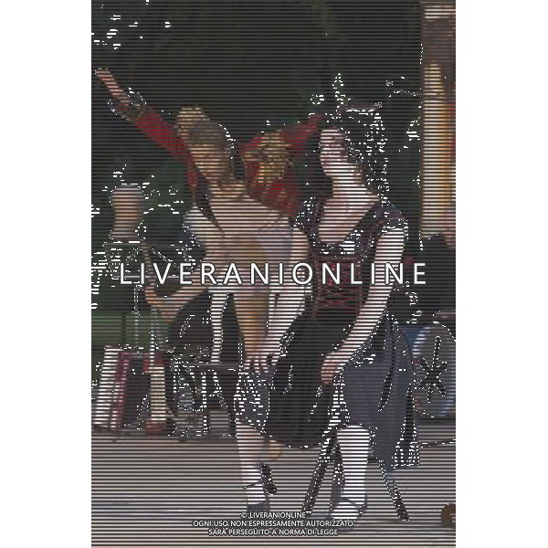 10 July 2014, Muelheim an der Ruhr, Germany. L-R: Maria Neumann as Christian and Dagmar Geppert as Marie. Roberto Ciulli\'s Theater an der Ruhr perform \'Woyzeck - ein musikalischer Fall\' as part of their open-air season \'Weisse Naechte\' (White Nights) in Raffelbergpark in Muelheim an der Ruhr, Germany. With Rupert J Seidl as Franz Woyzeck, Dagmar Geppert as Marie and Maria Neumann as Christian, Marie\'s child. ©PHOTOSHOT/Agenzia Aldo Liverani sas - ITALY ONLY - EDITORIAL USE ONLY