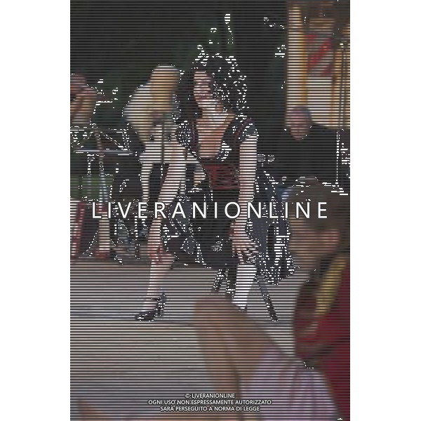 10 July 2014, Muelheim an der Ruhr, Germany. Pictured: Dagmar Geppert as Marie with Maria Neumann as Christan at the front. and Roberto Ciulli\'s Theater an der Ruhr perform \'Woyzeck - ein musikalischer Fall\' as part of their open-air season \'Weisse Naechte\' (White Nights) in Raffelbergpark in Muelheim an der Ruhr, Germany. With Rupert J Seidl as Franz Woyzeck, Dagmar Geppert as Marie and Maria Neumann as Christian, Marie\'s child. ©PHOTOSHOT/Agenzia Aldo Liverani sas - ITALY ONLY - EDITORIAL USE ONLY