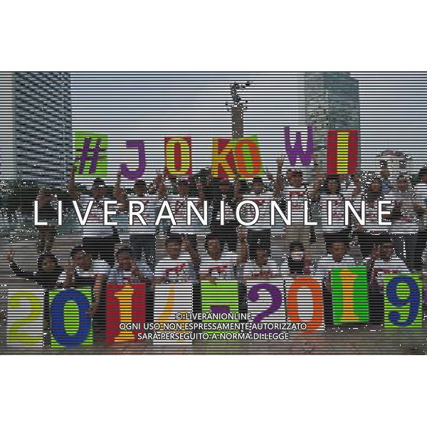 (140709) -- JAKARTA, July 9, 2014 () -- Supporters of presidential candidate Joko Widodo and his running mate Jusuf Kalla attend a rally to celebrate the victory in the presidential election after quick count in Jakarta, Indonesia, July 9, 2014. Both presidential hopefuls running in Indonesia\'s election claimed victories on Wednesday following publications of differing quick count results. (/Veri Sanovri) (lyi) ©PHOTOSHOT/Agenzia Aldo Liverani sas - ITALY ONLY - EDITORIAL USE ONLY ©photoshot/Agenzia Aldo Liverani sas - ITALY ONLY - EDITORIAL USE ONLY ©PHOTOSHOT/Agenzia Aldo Liverani sas - - ITALY ONLY - EDITORIAL USE ONLY - elezioni presidenziali in Indonesia, Luglio 2014