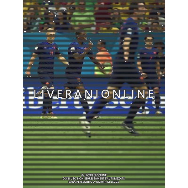 (140712) -- BRASILIA, July 12, 2014 () -- Netherlands\' Georginio Wijnaldum (2nd L) celebrates after scoring a goal during the third place play-off match between Brazil and Netherlands of 2014 FIFA World Cup at the Estadio Nacional Stadium in Brasilia, Brazil, on July 12, 2014. Netherlands won 3-0 over Brazil and took the third place of the tournament on Saturday. (/Guo Yong)(pcy) AG ALDO LIVERANI SAS ONLY ITALY