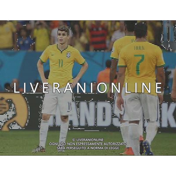 (140712) -- BRASILIA, July 12, 2014 () -- Brazil\'s Oscar (L) reacts after the third place play-off match between Brazil and Netherlands of 2014 FIFA World Cup at the Estadio Nacional Stadium in Brasilia, Brazil, on July 12, 2014. Netherlands won 3-0 over Brazil and took the third place of the tournament on Saturday.(/Cao Can)(rh) AG ALDO LIVERANI SAS ONLY ITALY