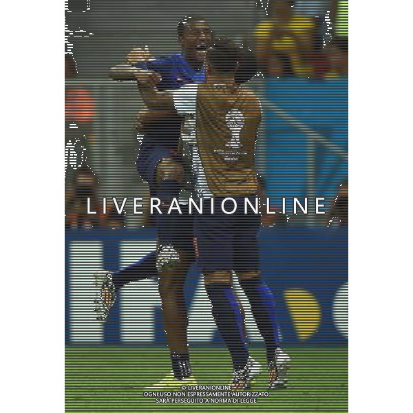 (140712) -- BRASILIA, July 12, 2014 () -- Netherlands\' Georginio Wijnaldum (L) celebrates after scoring a goal during the third place play-off match between Brazil and Netherlands of 2014 FIFA World Cup at the Estadio Nacional Stadium in Brasilia, Brazil, on July 12, 2014. Netherlands won 3-0 over Brazil and took the third place of the tournament on Saturday. (/Guo Yong)(pcy) AG ALDO LIVERANI SAS ONLY ITALY