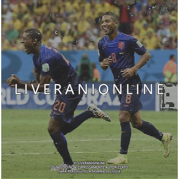 (140712) -- BRASILIA, July 12, 2014 () -- Netherlands\' Georginio Wijnaldum (L) celebrates his goal during the third place play-off match between Brazil and Netherlands of 2014 FIFA World Cup at the Estadio Nacional Stadium in Brasilia, Brazil, on July 12, 2014. Netherlands won 3-0 over Brazil and took the third place of the tournament on Saturday.(/Yang Lei)(rh) AG ALDO LIVERANI SAS ONLY ITALY