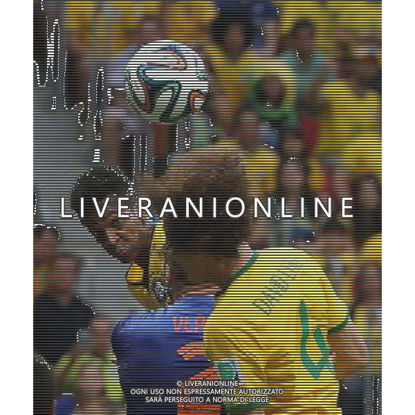 (140712) -- BRASILIA, July 12, 2014 () -- Netherlands\' Ron Vlaar (C) competes for a header with Brazil\'s Jo (L) and David Luiz (R) during the third place play-off match between Brazil and Netherlands of 2014 FIFA World Cup at the Estadio Nacional Stadium in Brasilia, Brazil, on July 12, 2014.(/Cao Can)(rh) AG ALDO LIVERANI SAS ONLY ITALY