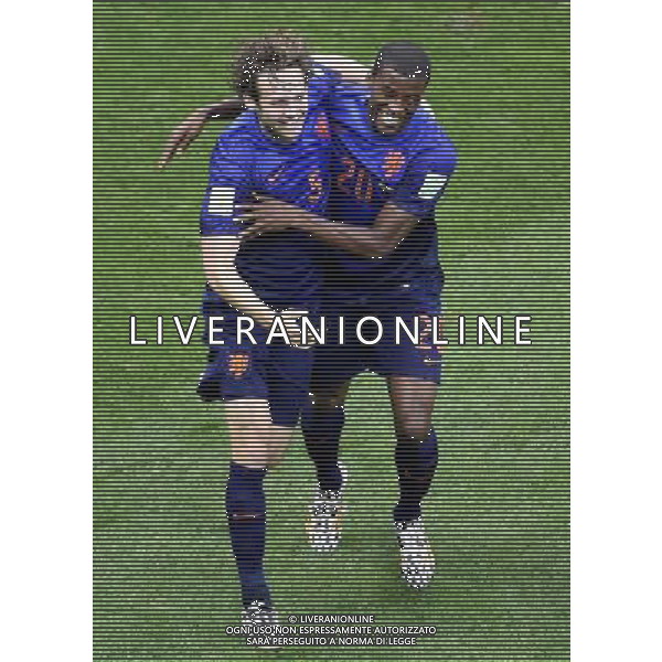 (140712) -- BRASILIA, July 12, 2014 () -- Netherlands\' Daley Blind (L) celebrates with Georginio Wijnaldum after scoring a goal during the third place play-off match between Brazil and Netherlands of 2014 FIFA World Cup at the Estadio Nacional Stadium in Brasilia, Brazil, on July 12, 2014.(/Lui Siu Wai)(pcy) AG ALDO LIVERANI SAS ONLY ITALY