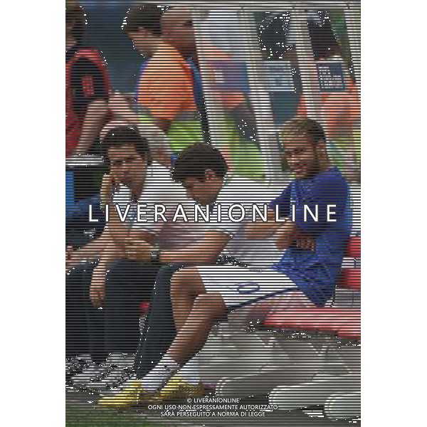 (140712) -- BRASILIA, July 12, 2014 () -- Brazil\'s Neymar (1st R) watches teammates\' training on the bench before the third place play-off match between Brazil and Netherlands of 2014 FIFA World Cup at the Estadio Nacional Stadium in Brasilia, Brazil, on July 12, 2014.(/Guo Yong)(pcy) AG ALDO LIVERANI SAS ONLY ITALY