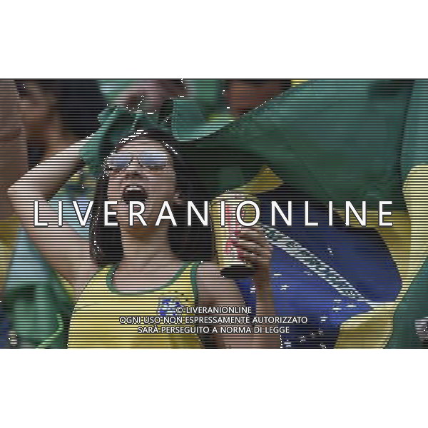 (140712) -- BRASILIA, July 12, 2014 () -- A Brazil\'s fan cheers for her team before the third place play-off match between Brazil and Netherlands of 2014 FIFA World Cup at the Estadio Nacional Stadium in Brasilia, Brazil, on July 12, 2014.(/Yang Lei)(rh) AG ALDO LIVERANI SAS ONLY ITALY