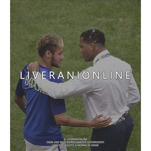 (140712) -- BRASILIA, July 12, 2014 () -- Brazil\'s Neymar (L) talks with Netherlands\' assistant coach Patrick Kluivert before the third place play-off match between Brazil and Netherlands of 2014 FIFA World Cup at the Estadio Nacional Stadium in Brasilia, Brazil, on July 12, 2014.(/Lui Siu Wai)(pcy) AG ALDO LIVERANI SAS ONLY ITALY