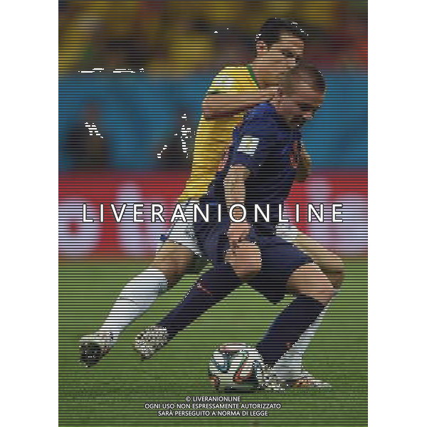 (140712) -- BRASILIA, July 12, 2014 () -- Netherlands\' Jordy Clasie (R) controls the ball against Brazil\'s Paulinho during the third place play-off match between Brazil and Netherlands of 2014 FIFA World Cup at the Estadio Nacional Stadium in Brasilia, Brazil, on July 12, 2014.(/Guo Yong)(pcy) AG ALDO LIVERANI SAS ONLY ITALY