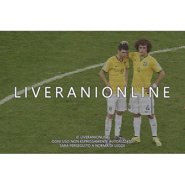 (140712) -- BRASILIA, July 12, 2014 () -- Brazil\'s Oscar (L) and David Luiz react after the third place play-off match between Brazil and Netherlands of 2014 FIFA World Cup at the Estadio Nacional Stadium in Brasilia, Brazil, on July 12, 2014. Netherlands won 3-0 over Brazil and took the third place of the tournament on Saturday. (/Lui Siu Wai)(pcy) AG ALDO LIVERANI SAS ONLY ITALY