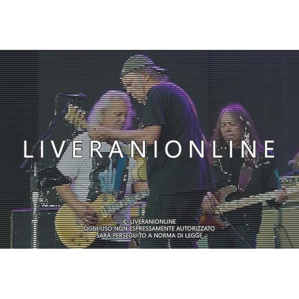 Guitarist Frank Sampredo and bassist Rick Rosas of Crazy Horse and Canadian singer-songwriter Neil Young performing at British Summer Time, Hyde Park, London, England, UK on Saturday 12th July 2014. AG ALDO LIVERANI SAS ONLY ITALY