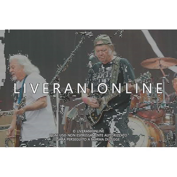 Frank Sampredo of Crazy Horse and Canadian singer-songwriter Neil Young performing at British Summer Time, Hyde Park, London, England, UK on Saturday 12th July 2014. AG ALDO LIVERANI SAS ONLY ITALY