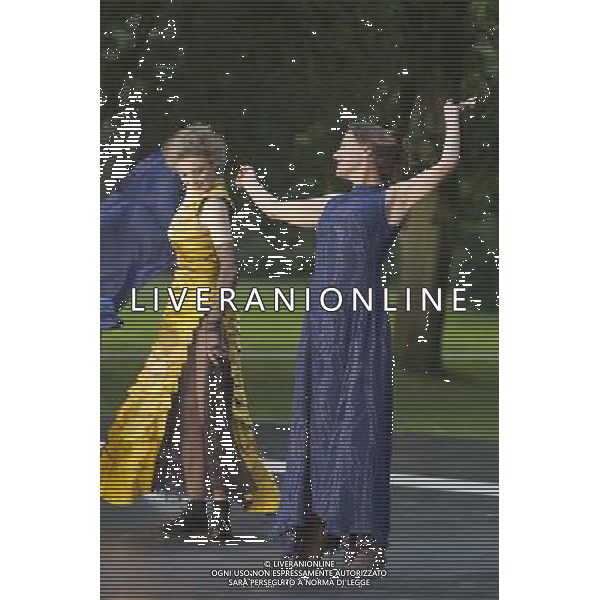11 July 2014, Muelheim/Ruhr, Germany. Simone Thoma as Antigone and Petra von der Beek as Ismene. Roberto Ciulli\'s \'Theater an der Ruhr\' perform \'Antigone\' as part of their open-air season \'Weisse Naechte\' (White Nights) in Raffelbergpark, Muelheim an der Ruhr, Germany. AG ALDO LIVERANI SAS ONLY ITALY