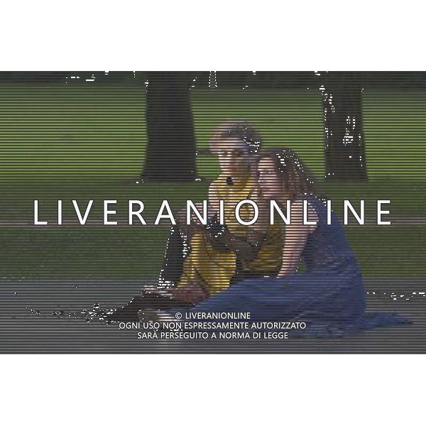 11 July 2014, Muelheim/Ruhr, Germany. Simone Thoma as Antigone and Petra von der Beek as Ismene. Roberto Ciulli\'s \'Theater an der Ruhr\' perform \'Antigone\' as part of their open-air season \'Weisse Naechte\' (White Nights) in Raffelbergpark, Muelheim an der Ruhr, Germany. AG ALDO LIVERANI SAS ONLY ITALY