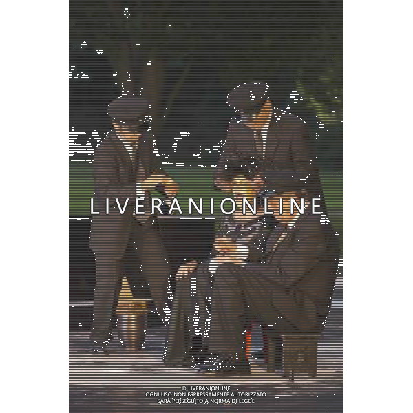 11 July 2014, Muelheim/Ruhr, Germany. Rosmarie Bruecher as Euridyke with Ferhat Keskin, Klaus Herzog and Rupert J Seidl as Chorus. Roberto Ciulli\'s \'Theater an der Ruhr\' perform \'Antigone\' as part of their open-air season \'Weisse Naechte\' (White Nights) in Raffelbergpark, Muelheim an der Ruhr, Germany. AG ALDO LIVERANI SAS ONLY ITALY