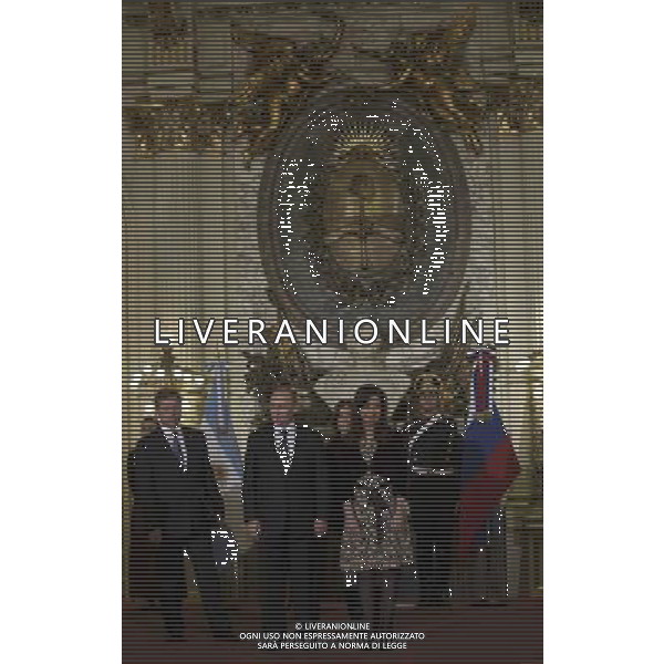 (140712) -- BUENOS AIRES, July 12, 2014 () -- Argentinian President, Cristina Fernandez (front R) reacts next to her Russian counterpart Vladimir Putin (front L) during their meeting at the White Hall of the Casa Rosada, in Buenos Aires city, capital of Argentina, on July 12, 2014. Putin is in an official visit to Argentina where he will sign bilateral agreements prior to attend the BRICS group meeting (Brazil, Russia, India, China and South Africa), which will take place in Brazil, according to local media. (/Martin Zabala) (jg) (fnc) AG ALDO LIVERANI SAS ONLY ITALY