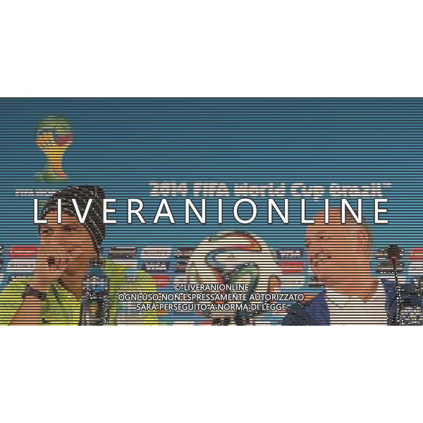 (140711) -- BRASILIA, July 11, 2014 () -- Brazil\'s coach Luiz Felipe Scolari(R) and player Thiago Silva smile during a press conference at the Estadio Nacional Stadium in Brasilia, Brazil, on July 5, 2014. Brazil will play the 2014 FIFA World Cup football match for third place against Netherlands on Saturday.(/Cao Can)(wll) AG ALDO LIVERANI SAS ONLY ITALY