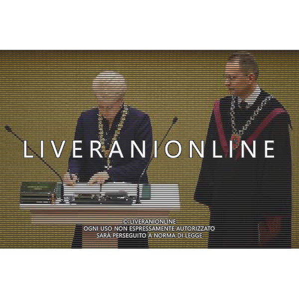 (140712) -- VILNIUS, July 12, 2014 () -- Dalia Grybauskaite (L) signs during her inauguration of presidency in Vilnius, Lithuania, on July 12, 2014. Grybauskaite was reelected president of Lithuania in May with roughly 58 percent of supportive votes, making her the first president of the Baltic country to be consecutively elected. (/Alfredas Pliadis) AG ALDO LIVERANI SAS ONLY ITALY