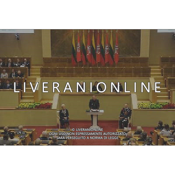 (140712) -- VILNIUS, July 12, 2014 () -- Dalia Grybauskaite (L) signs during her inauguration of presidency in Vilnius, Lithuania, on July 12, 2014. Grybauskaite was reelected president of Lithuania in May with roughly 58 percent of supportive votes, making her the first president of the Baltic country to be consecutively elected. (/Alfredas Pliadis) AG ALDO LIVERANI SAS ONLY ITALY