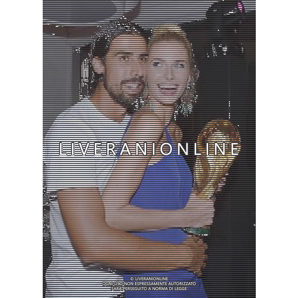 firo : 13.07.2014 Fu§ball, Fussball, WM 2014 Brasilien, Weltmeisterschaft 2014 Brasilien, Football World Championships Brazil 2014, 2014 FIFA WORLD CUP BRAZIL,Brasil,Bresil, WM-Finale 2014, Endspiel 2014, Finale 2014, GER, Deutschland - ARG, Argentinien 1:0 Weltmeister 2014 Deutschland, Sami KHEDIRA (Deutschland) und Freundin Lena Gercke mit Weltpokal / WM-Pokal . DFB-WM Party/ Gala / Feier nach dem Finale im Hotel Sheraton Rio de Janeiro. $worldrights Es gelten unsere AGB, einsehbar auf www.firosportphoto.de Poolfoto : GES, copyright by firo sportphoto, Coesfelder Str.207 48249 DŸlmen www.firosportphoto.de mail@firosportphoto.de (V o l k s b a n k B o c h u m - W i t t e n ) BLZ.: 430 601 29 Kt. Nr.: 341 117 100 Tel:Ê 02594 - 9916004 Fax:Ê02594 - 9916005 AG ALDO LIVERANI SAS ONLY ITALY *** Local Caption ***