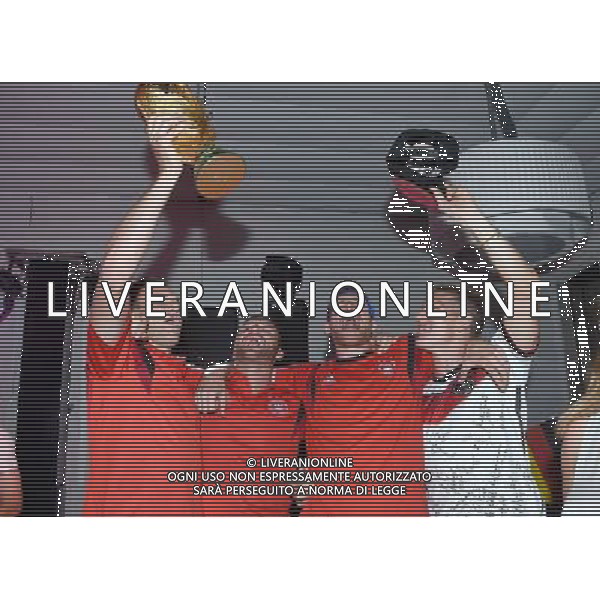 firo : 13.07.2014 Fu§ball, Fussball, WM 2014 Brasilien, Weltmeisterschaft 2014 Brasilien, Football World Championships Brazil 2014, 2014 FIFA WORLD CUP BRAZIL,Brasil,Bresil, WM-Finale 2014, Endspiel 2014, Finale 2014, GER, Deutschland - ARG, Argentinien 1:0 Weltmeister 2014 Deutschland, v.l.: Kevin Grosskreutz (Deutschland), Shkodran MUSTAFI (Deutschland), Per MERTESACKER (Deutschland) und Bastian SCHWEINSTEIGER (Deutschland) feiern mit dem Weltpokal / WM-Pokal . DFB-WM Party/ Gala / Feier nach dem Finale im Hotel Sheraton Rio de Janeiro. $worldrights Es gelten unsere AGB, einsehbar auf www.firosportphoto.de Poolfoto : GES, copyright by firo sportphoto, Coesfelder Str.207 48249 DŸlmen www.firosportphoto.de mail@firosportphoto.de (V o l k s b a n k B o c h u m - W i t t e n ) BLZ.: 430 601 29 Kt. Nr.: 341 117 100 Tel:Ê 02594 - 9916004 Fax:Ê02594 - 9916005 AG ALDO LIVERANI SAS ONLY ITALY *** Local Caption ***