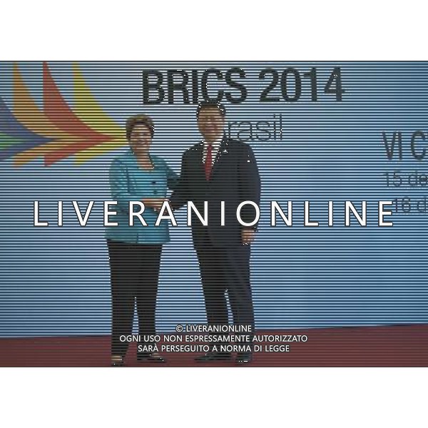 (140715) -- FORTALEZA, July 15, 2014 () -- Chinese President Xi Jinping (R) shakes hands with Brazilian President Dilma Rousseff during the sixth BRICS summit in Fortaleza, Brazil, July 15, 2014. (/Lan Hongguang) (zkr) AG ALDO LIVERANI SAS ONLY ITALY