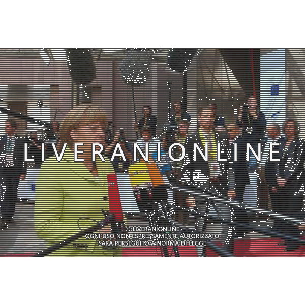 (140716) -- BRUSSELS, July 16, 2014 () -- German Chancellor Angela Merkel arrives to attend the Special Meeting of the European Council at the EU headquarters in Brussels, capital of Belgium, July 16, 2014. (/Gong Bing) ©PHOTOSHOT/Agenzia Aldo Liverani sas - ITALY ONLY - EDITORIAL USE ONLY - Riunione straordinaria del Consiglio europeo presso la sede dell\'Unione europea a Bruxelles, capitale del Belgio 16 luglio 2014