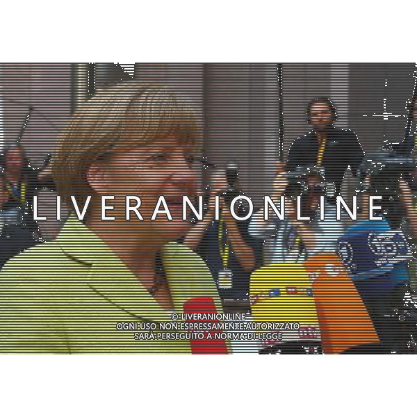 (140716) -- BRUSSELS, July 16, 2014 () -- German Chancellor Angela Merkel arrives to attend the Special Meeting of the European Council at the EU headquarters in Brussels, capital of Belgium, July 16, 2014. (/Gong Bing) ©PHOTOSHOT/Agenzia Aldo Liverani sas - ITALY ONLY - EDITORIAL USE ONLY - Riunione straordinaria del Consiglio europeo presso la sede dell\'Unione europea a Bruxelles, capitale del Belgio 16 luglio 2014